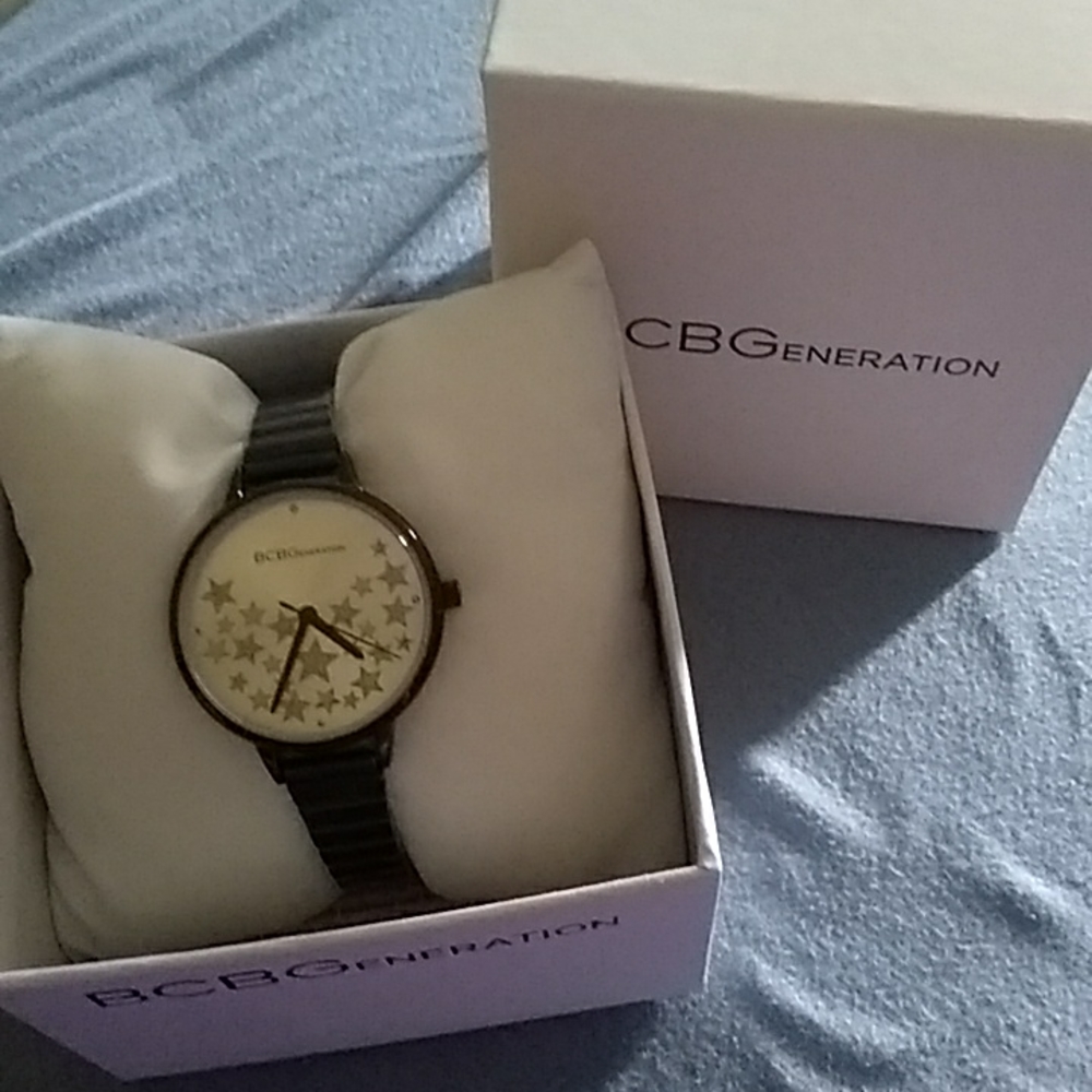 - BCBGeneration Black tone metal band watch